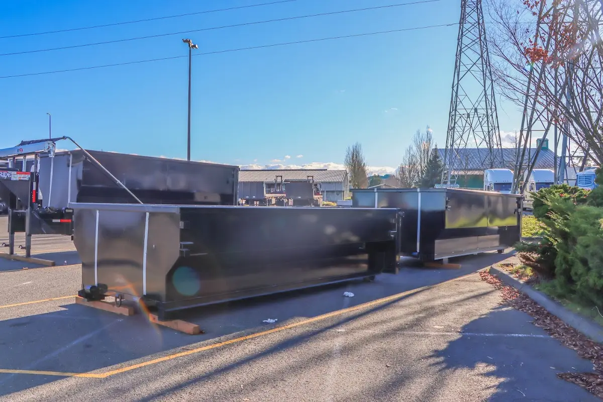 Roll-off dumpster ready for waste disposal at job site for 2 Yard Dumpster Rental in Charleston